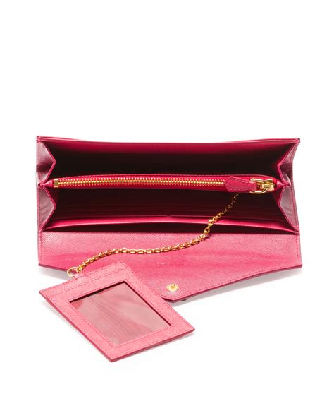 pink prada envelope wallet.